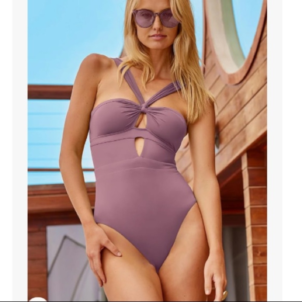 BECCA Women's color-coded one-piece convertible swimsuit.